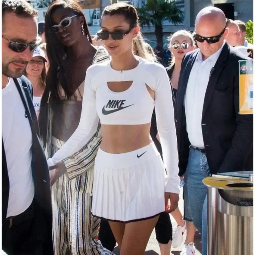 Nike White Crop Top and White Pleated Mini Skirt with Black Accents